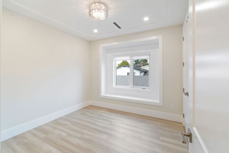 6591_Goldsmith_Drive_EsgeeCorporate-bedroom2